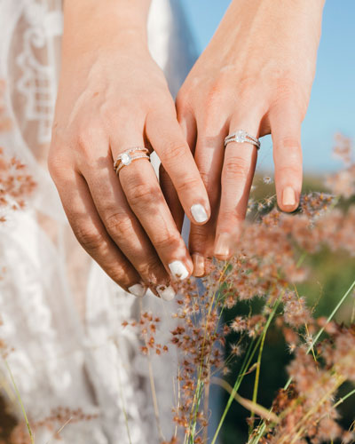 photo of two brides hands up close